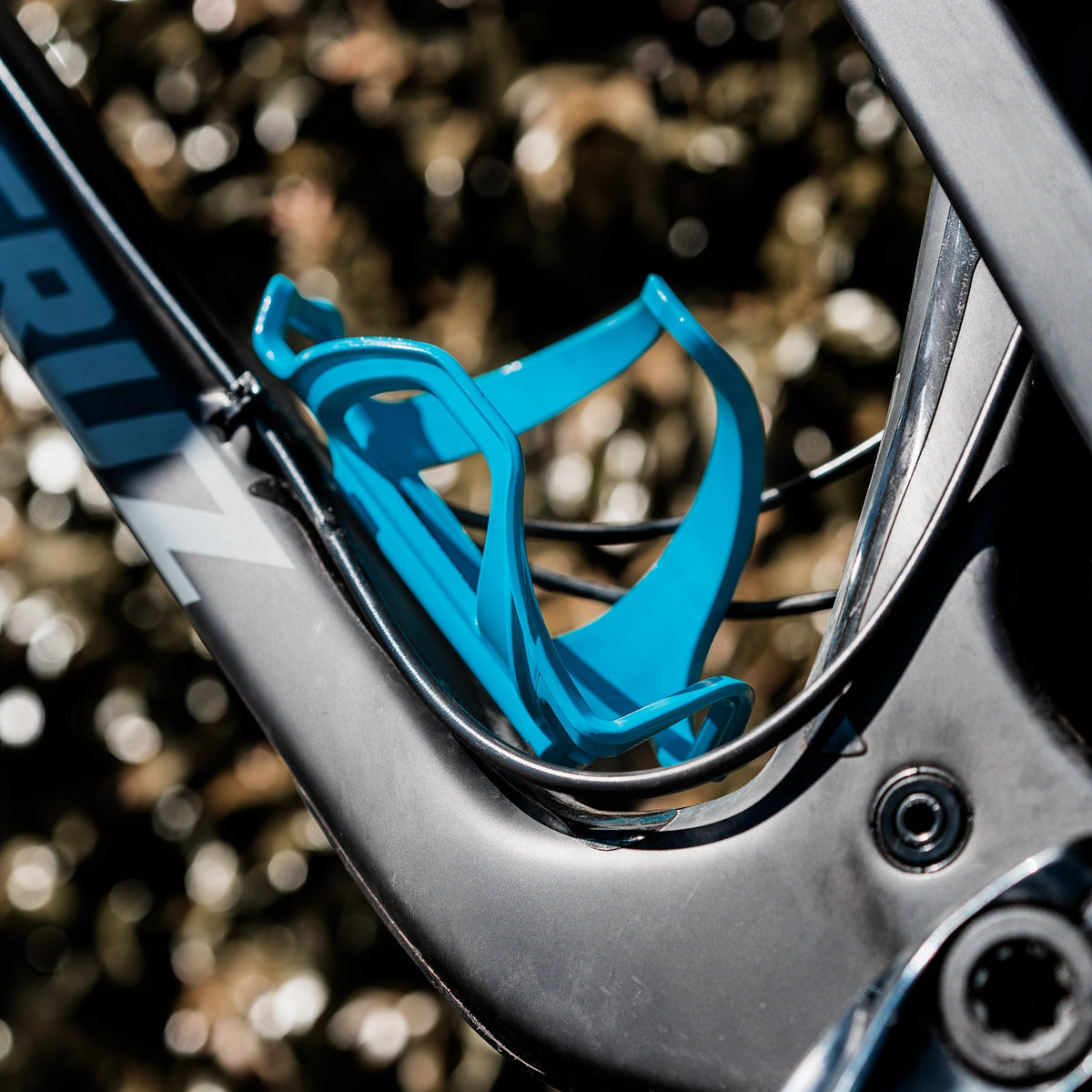 LEZYNE FLOW CAGE E SL-L Flaschenhalter mit Entnahme von links, Rot