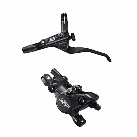 SHIMANO DEORE XT BR-M8100 / BL-T8100 Bremse mit 3-Finger-Trekkinghebel — Bremshebel und Bremssattel auf weißem Hintergrund